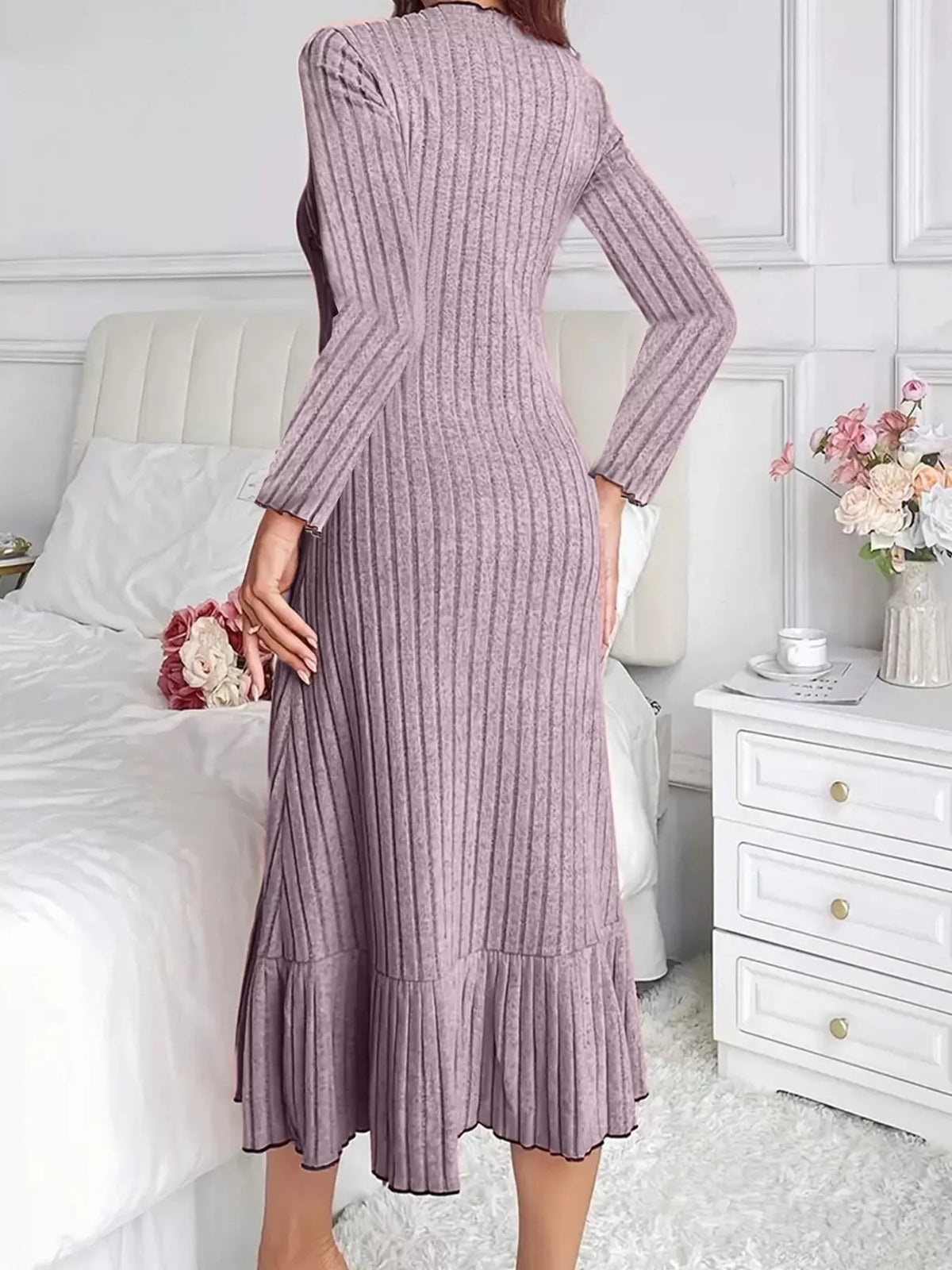 Light purple ribbed knit bodycon dress with long sleeves and ruffle hem—back view