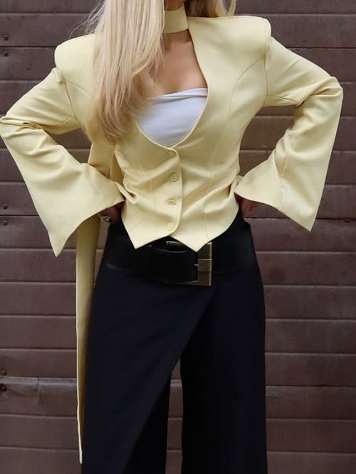 Pastel yellow button-up long-sleeve blazer with wide sleeves and front button placket