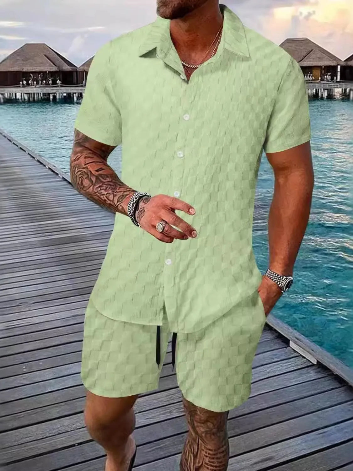 Light green textured collared short-sleeve shirt and matching shorts set with button front