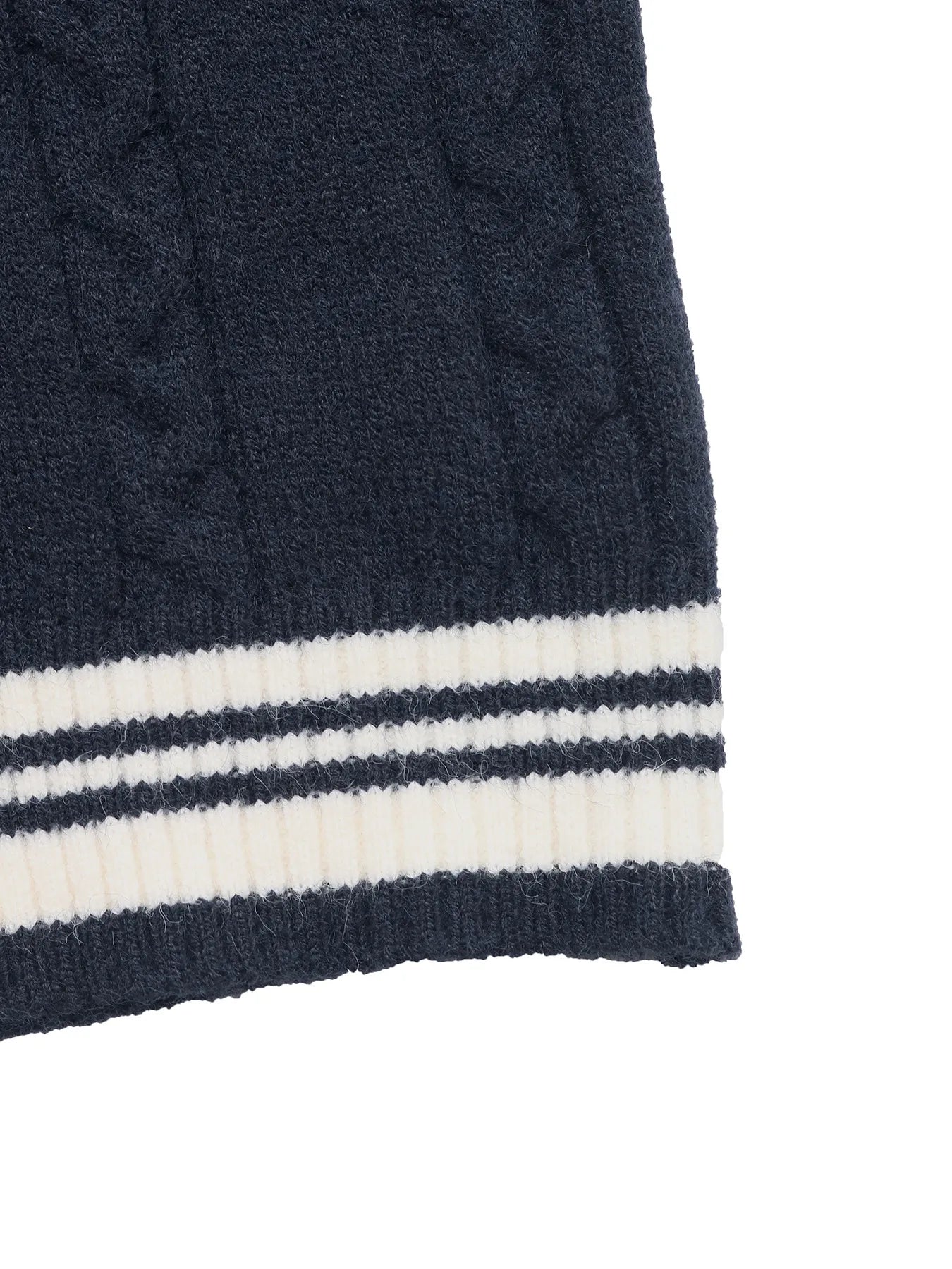 Dark blue sweater hem with contrast striped ribbed band