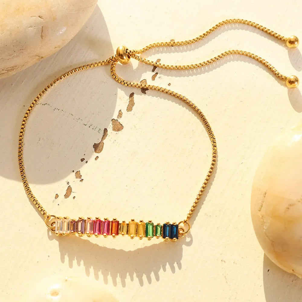 Gold-tone zircon tennis bracelet with rainbow multicolor gemstones