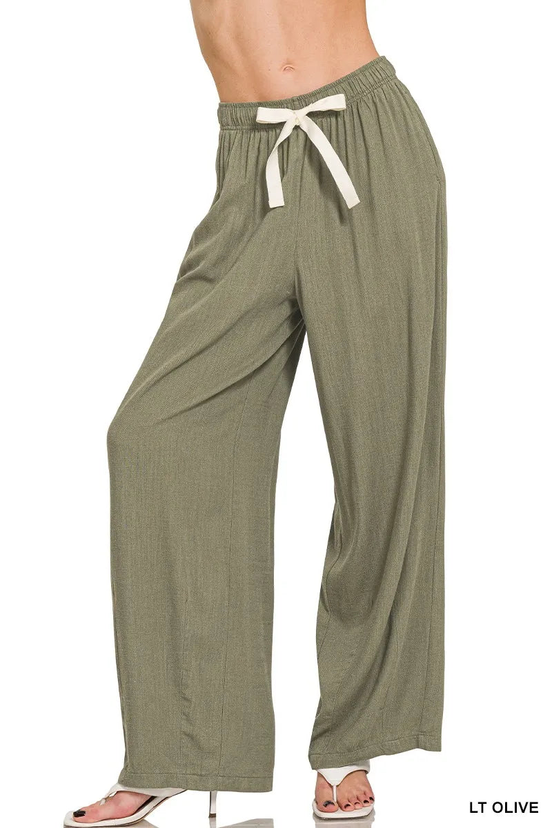 Light olive linen drawstring pants, tied elastic waistband, relaxed wide legs