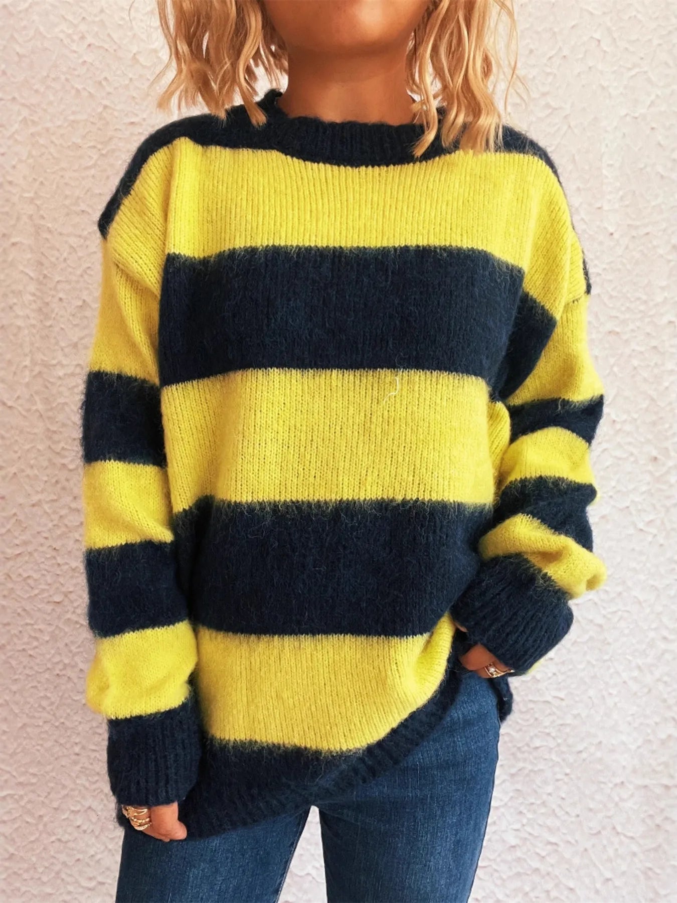 Yellow and navy striped long-sleeve sweater with crew neck and ribbed hem