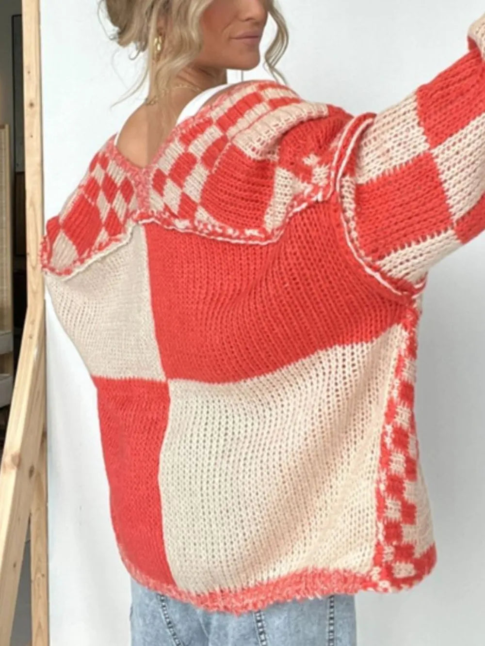 Plaid open-front long sleeve cardigan in red and cream knit, side view