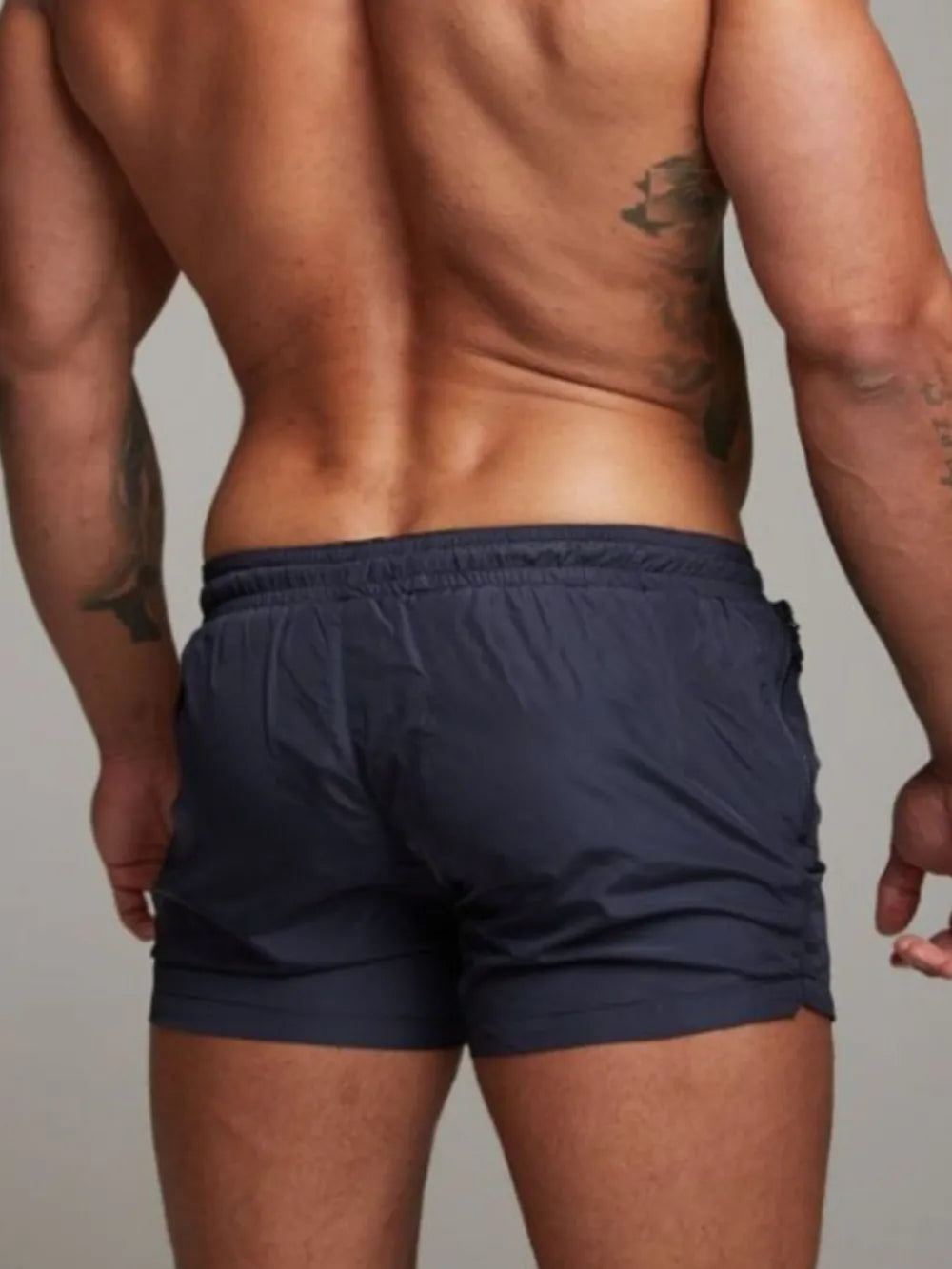 Men's active shorts in navy with elastic waistband and drawstring