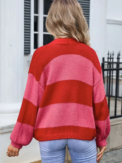 Striped knit cardigan, back view, red and pink block stripes, dropped shoulders