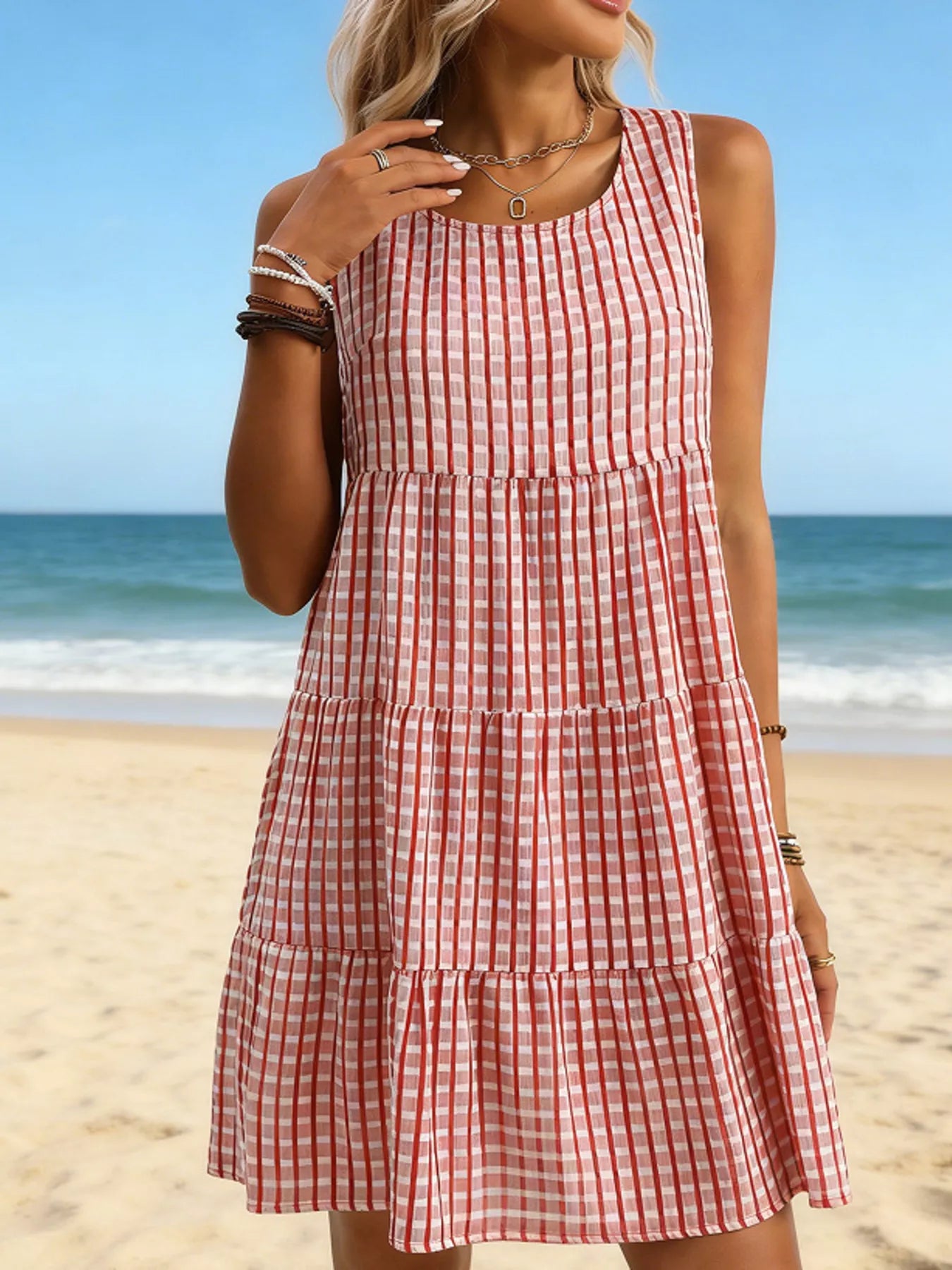 Pink red-check sleeveless tiered mini dress with empire waist and tiered skirt