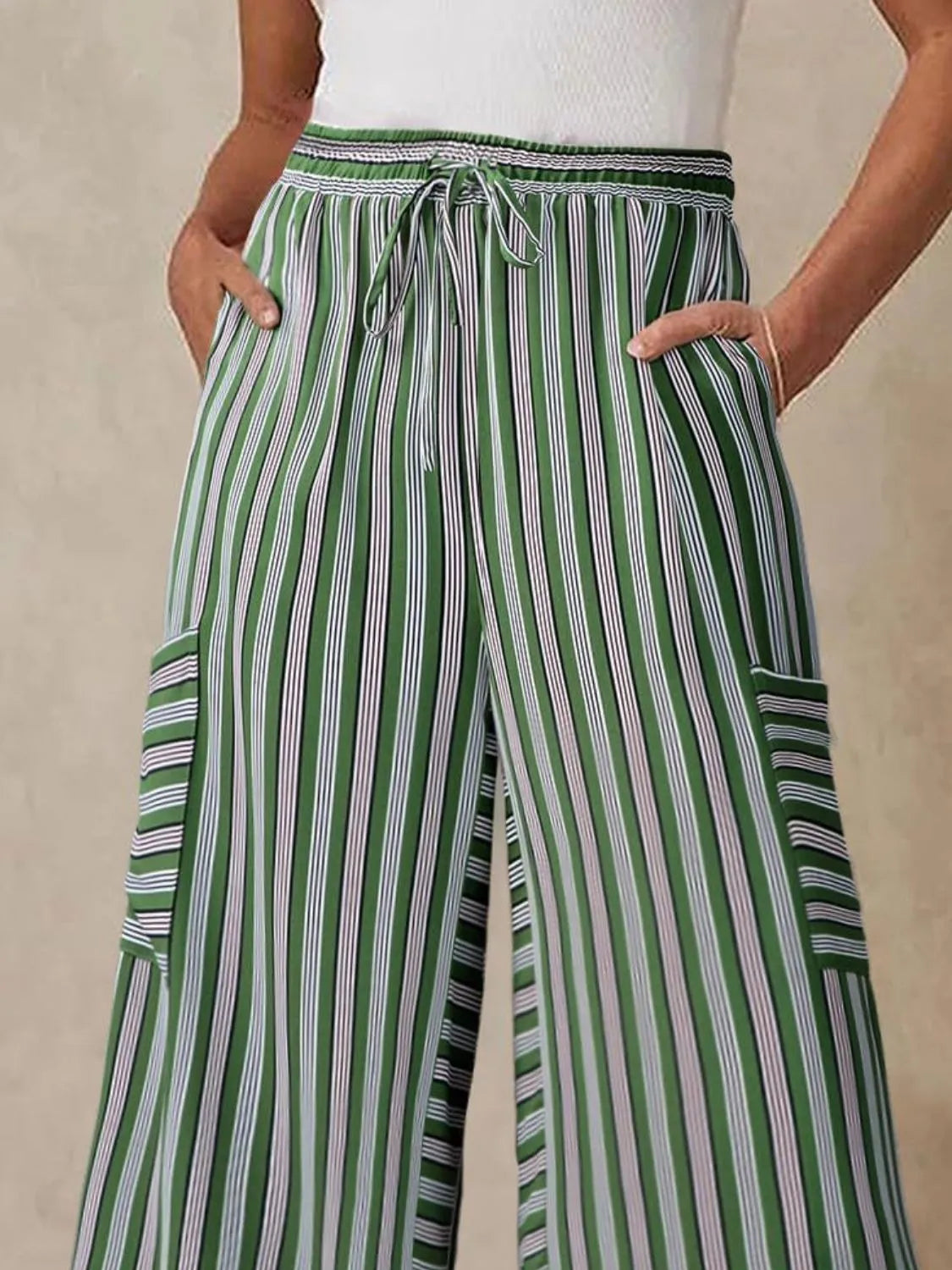 White and green striped wide-leg pants with drawstring elastic waist and patch pockets