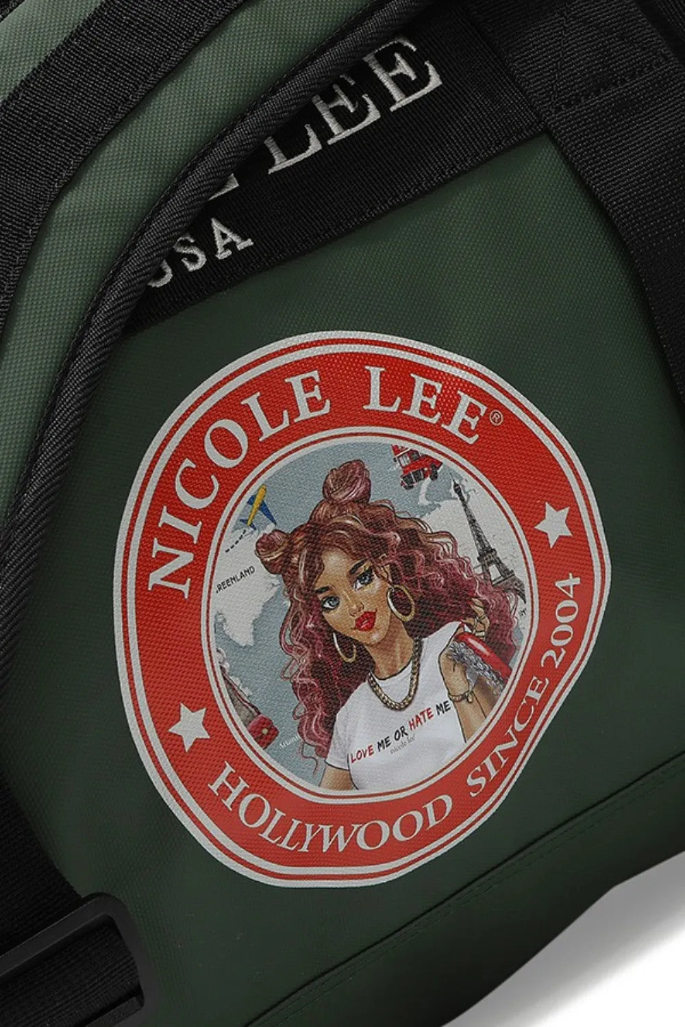 Green duffel bag interior close-up with red circular Hollywood-style logo