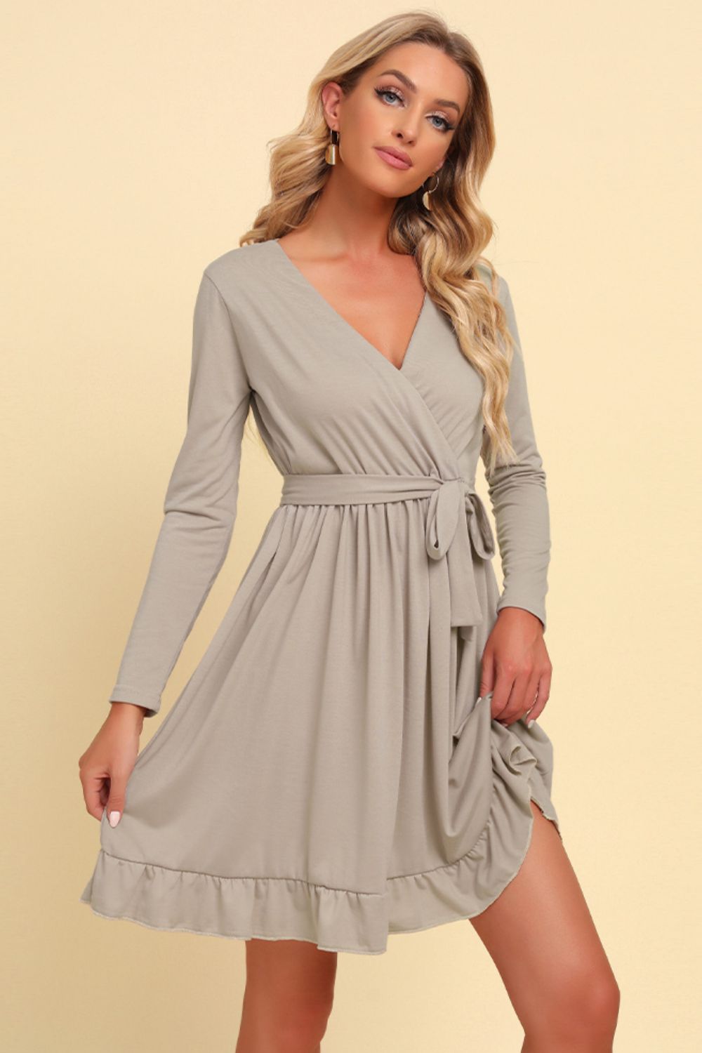 Long sleeve tie-waist ruffle hem dress, light gray with V-neck and gathered skirt