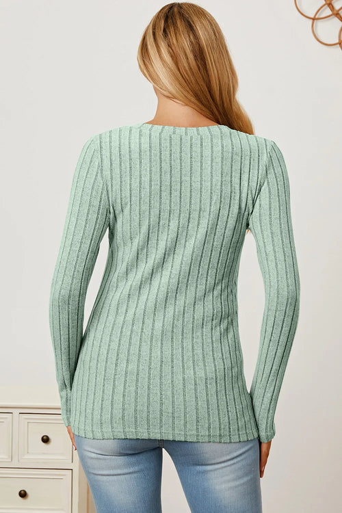 Light green ribbed V-neck long-sleeve T-shirt from back view.