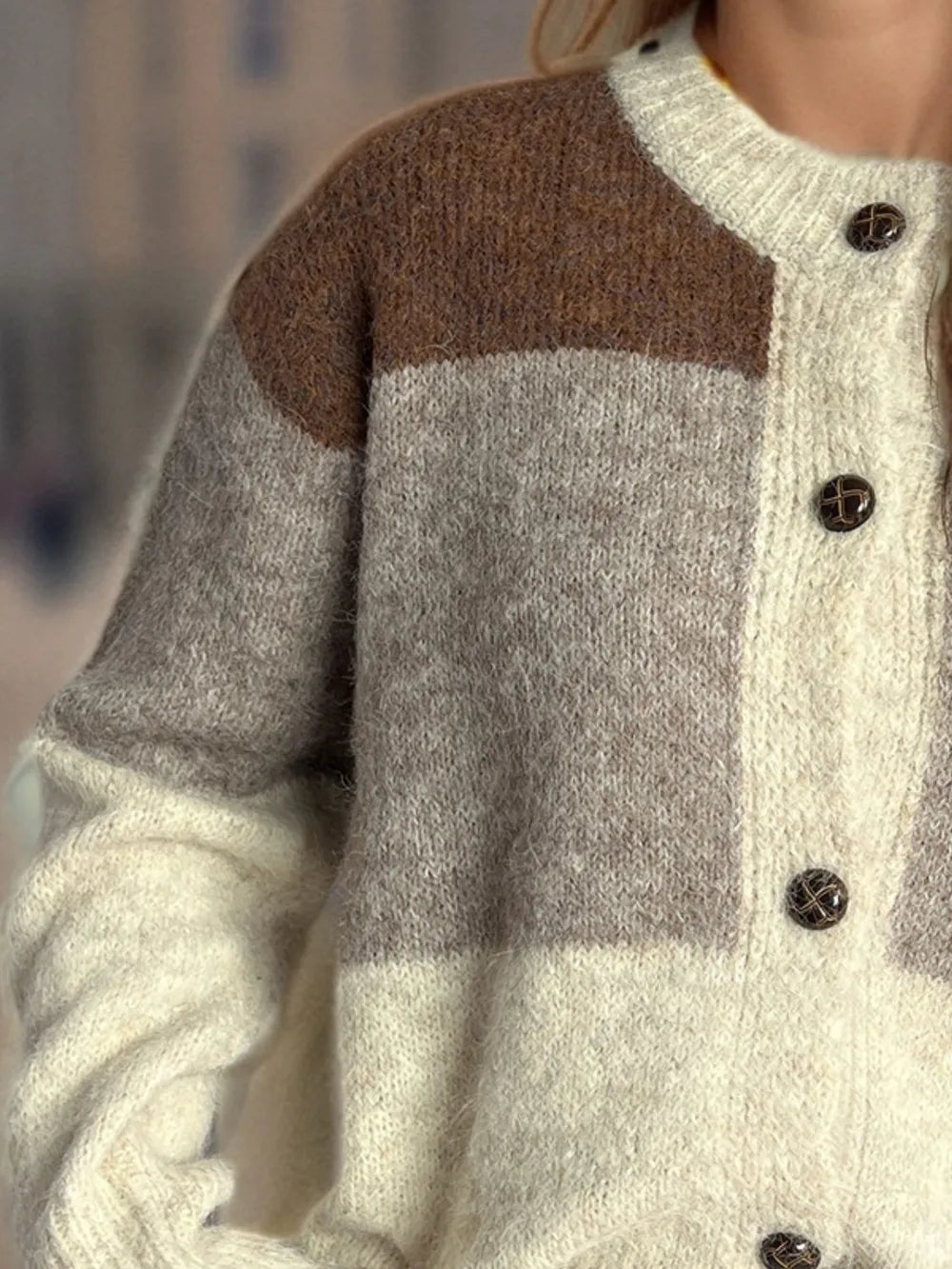 Color block round neck button-up cardigan, close view of brown and gray knit panels