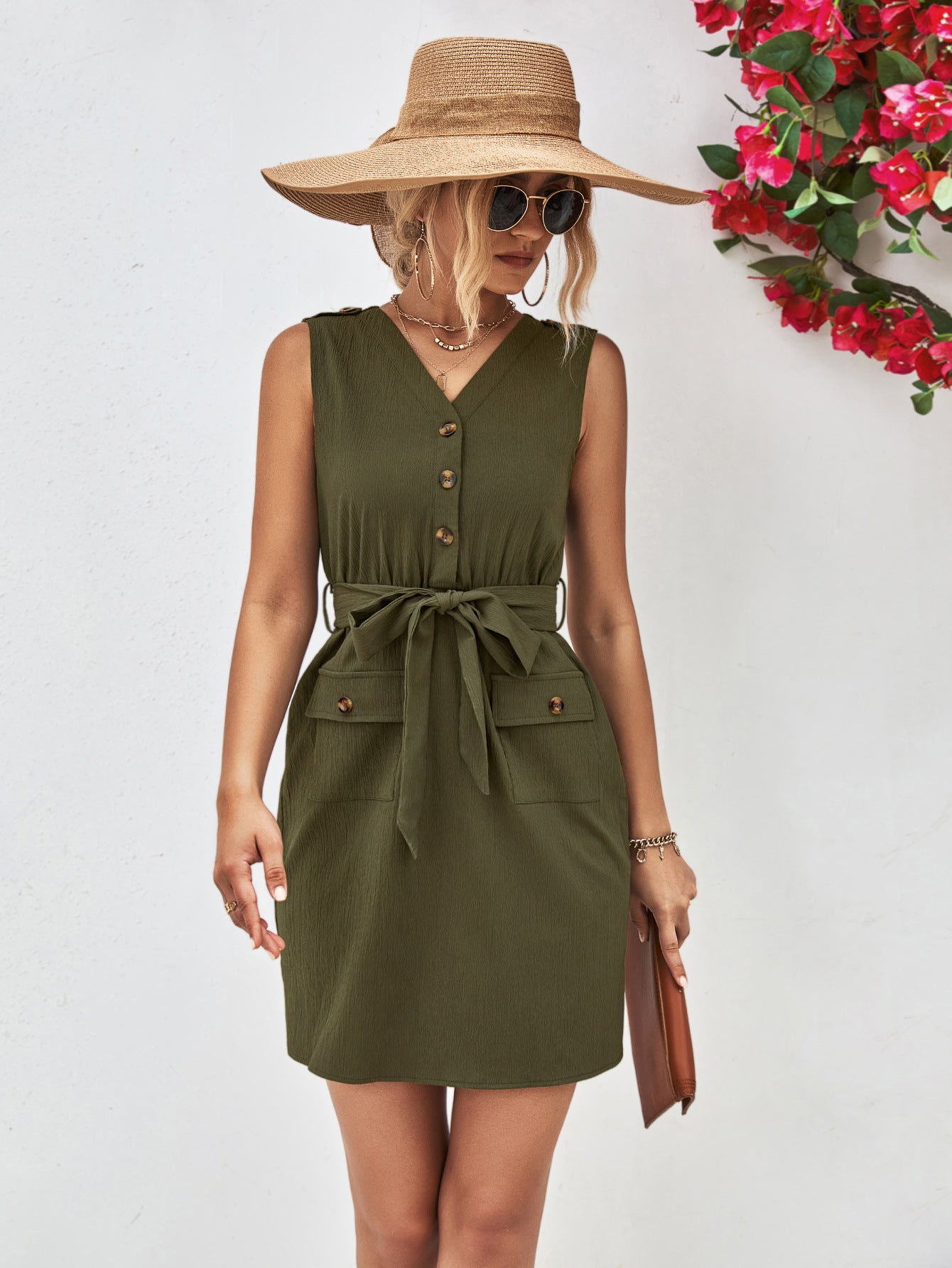 Army green sleeveless V-neck button dress with tied waist belt and flap pockets