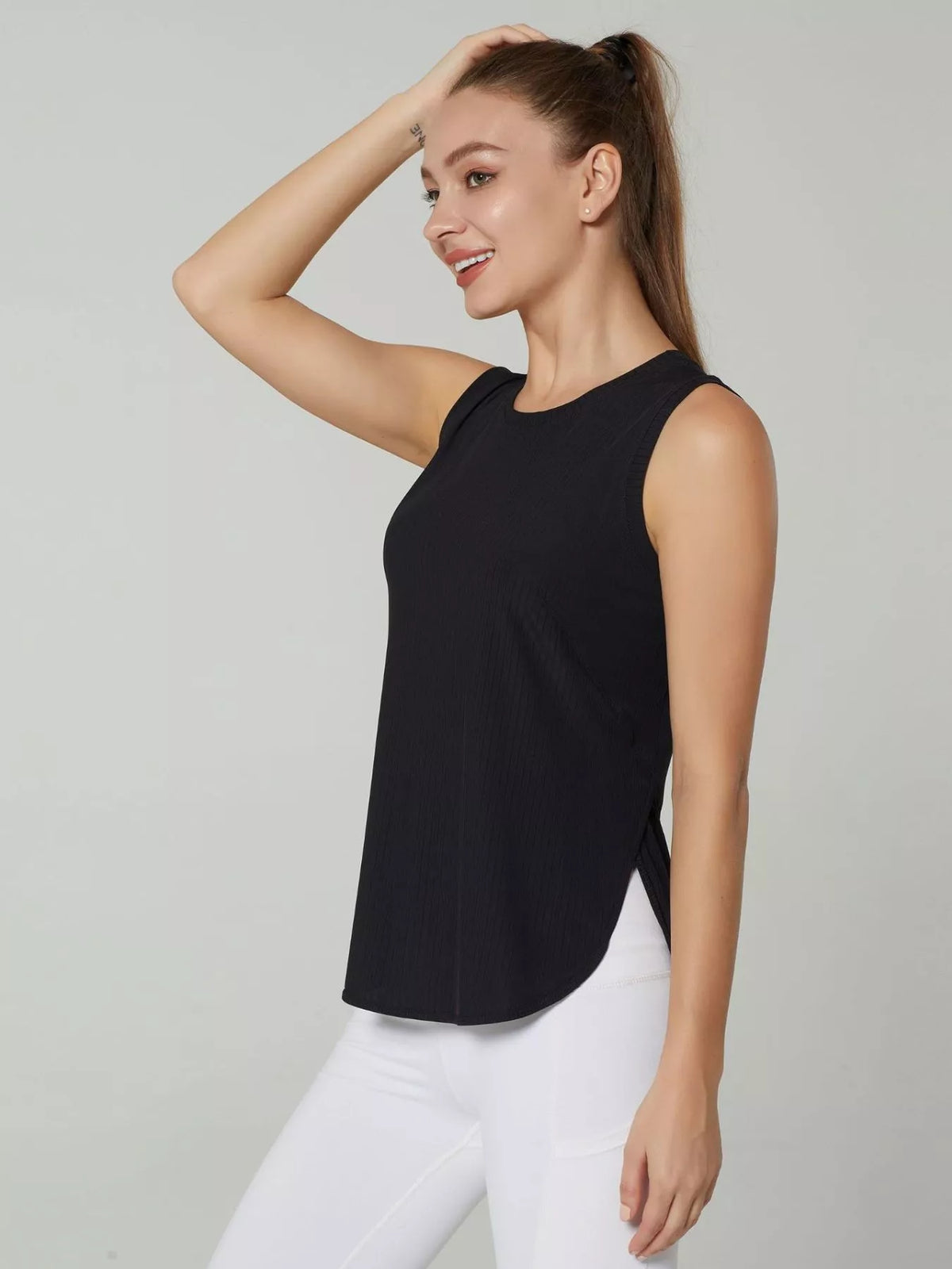 Black ribbed active tank top with crew neck and side slit hem