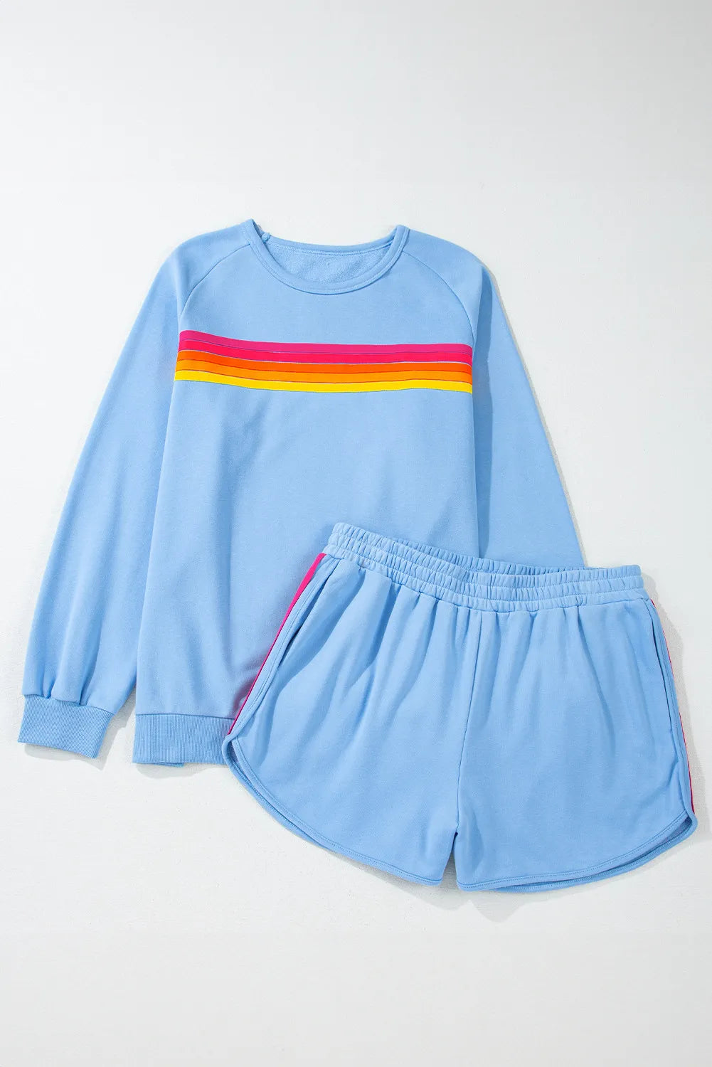 Round-neck top and shorts set in light blue with rainbow striped chest panel
