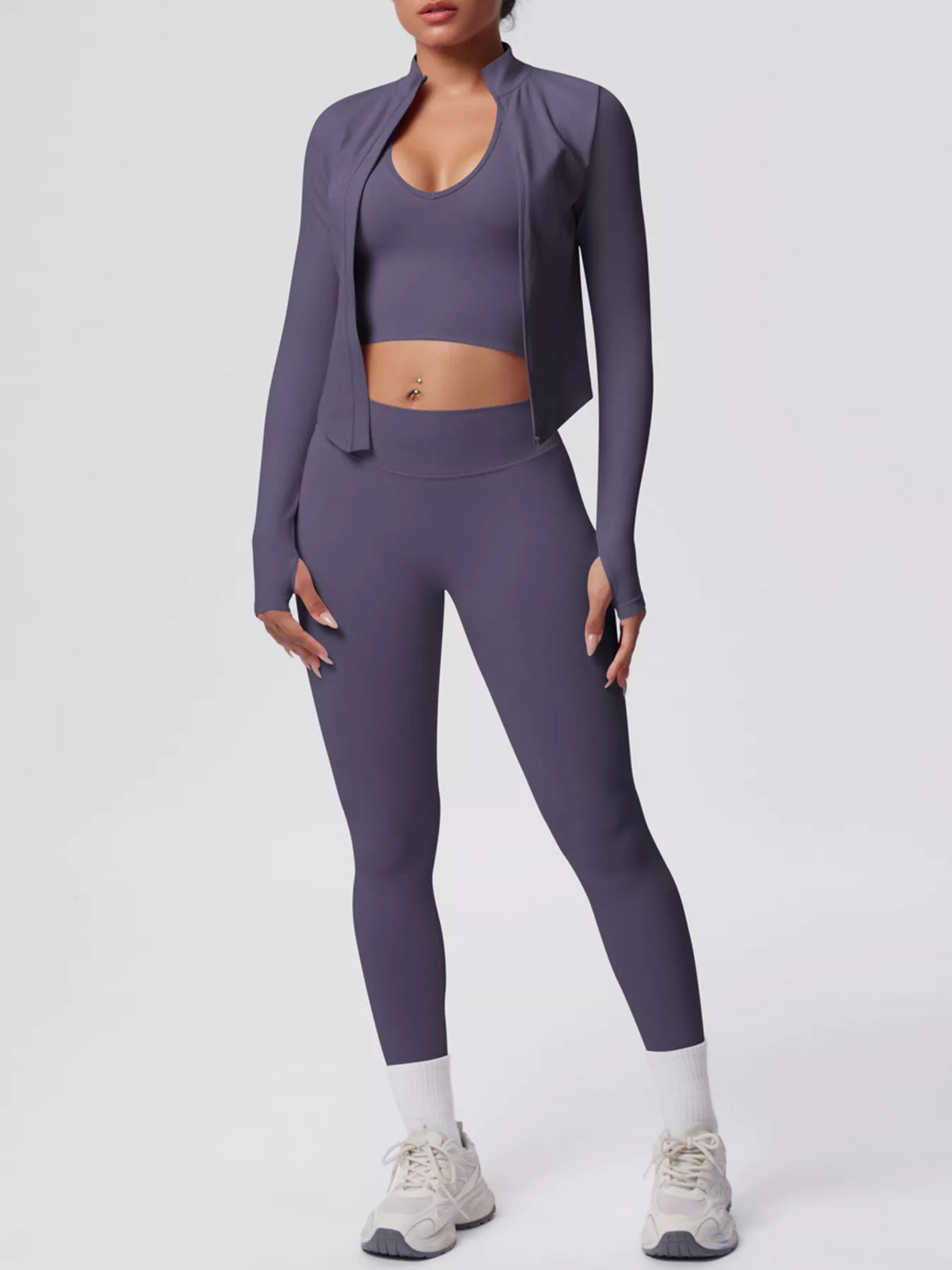 Mauve three-piece workout set with open zip jacket, sports bra and leggings