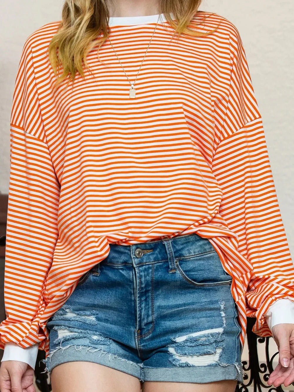 Contrast striped long-sleeve sweatshirt, orange contrast trim and orange-and-cream stripes