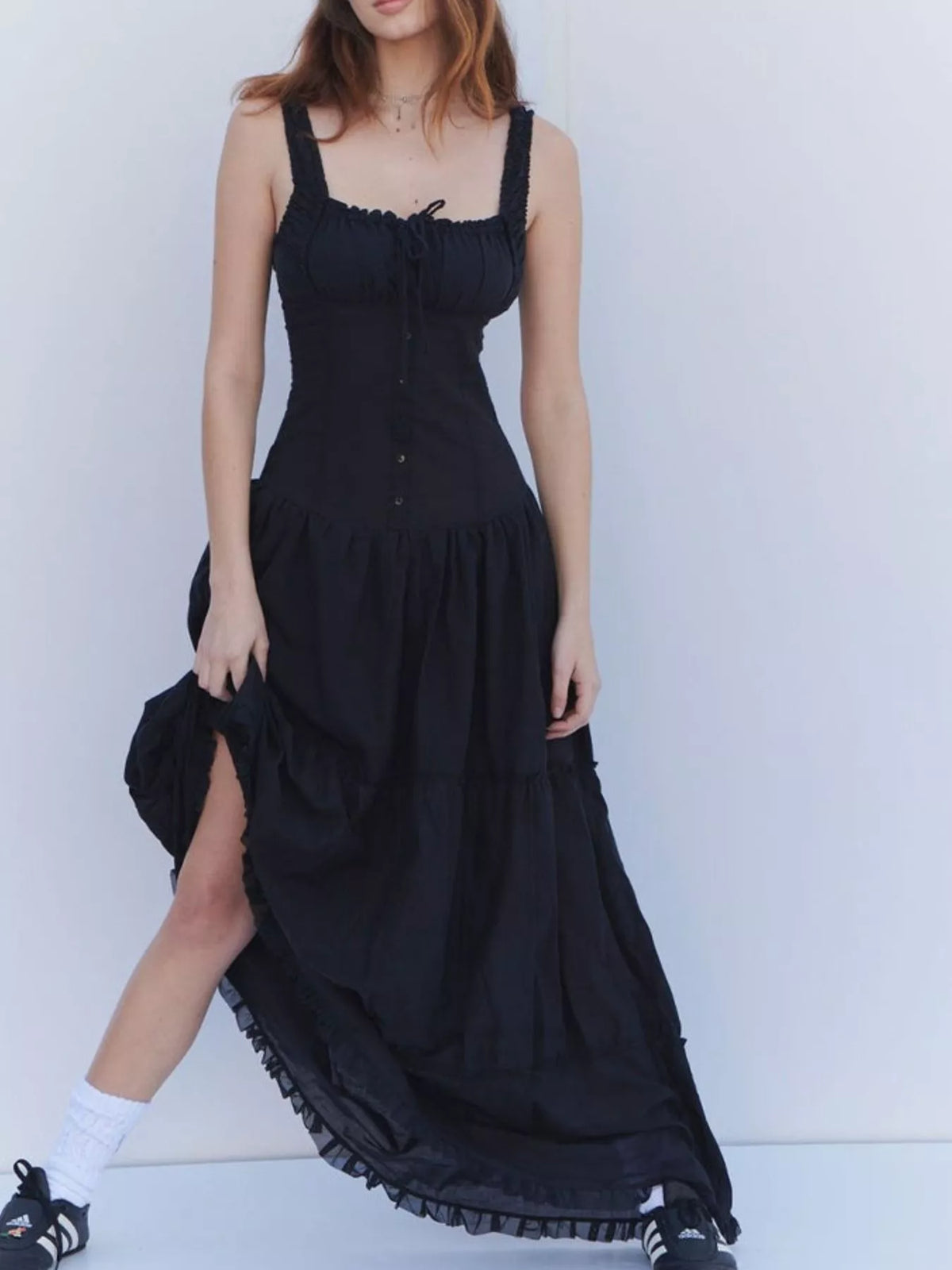 Black tiered cotton maxi dress with square neckline, button front, and ruffled hem