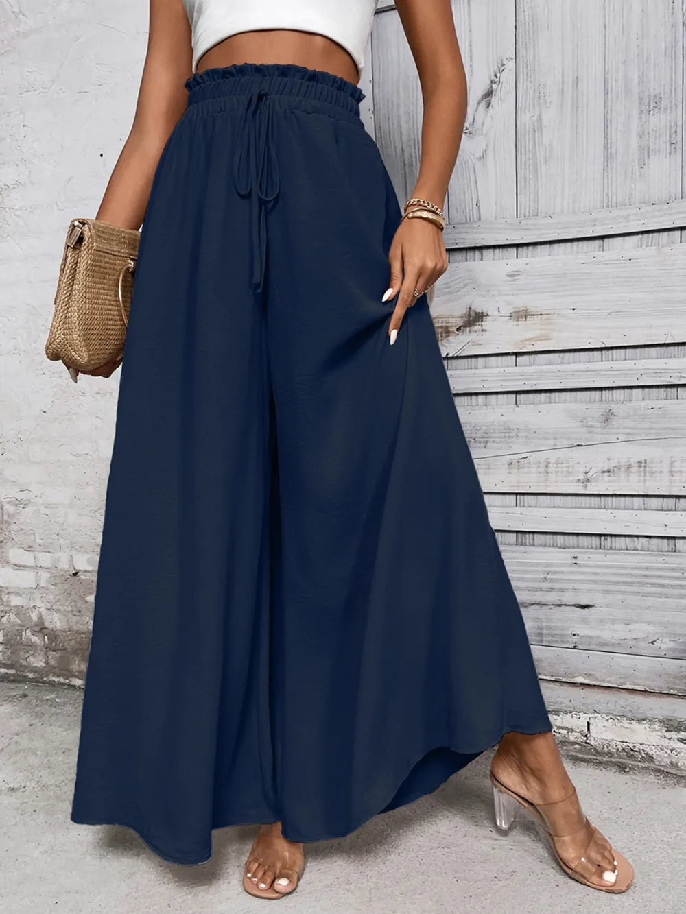 Navy high waist wide-leg pants with elastic waistband and drawstring ties