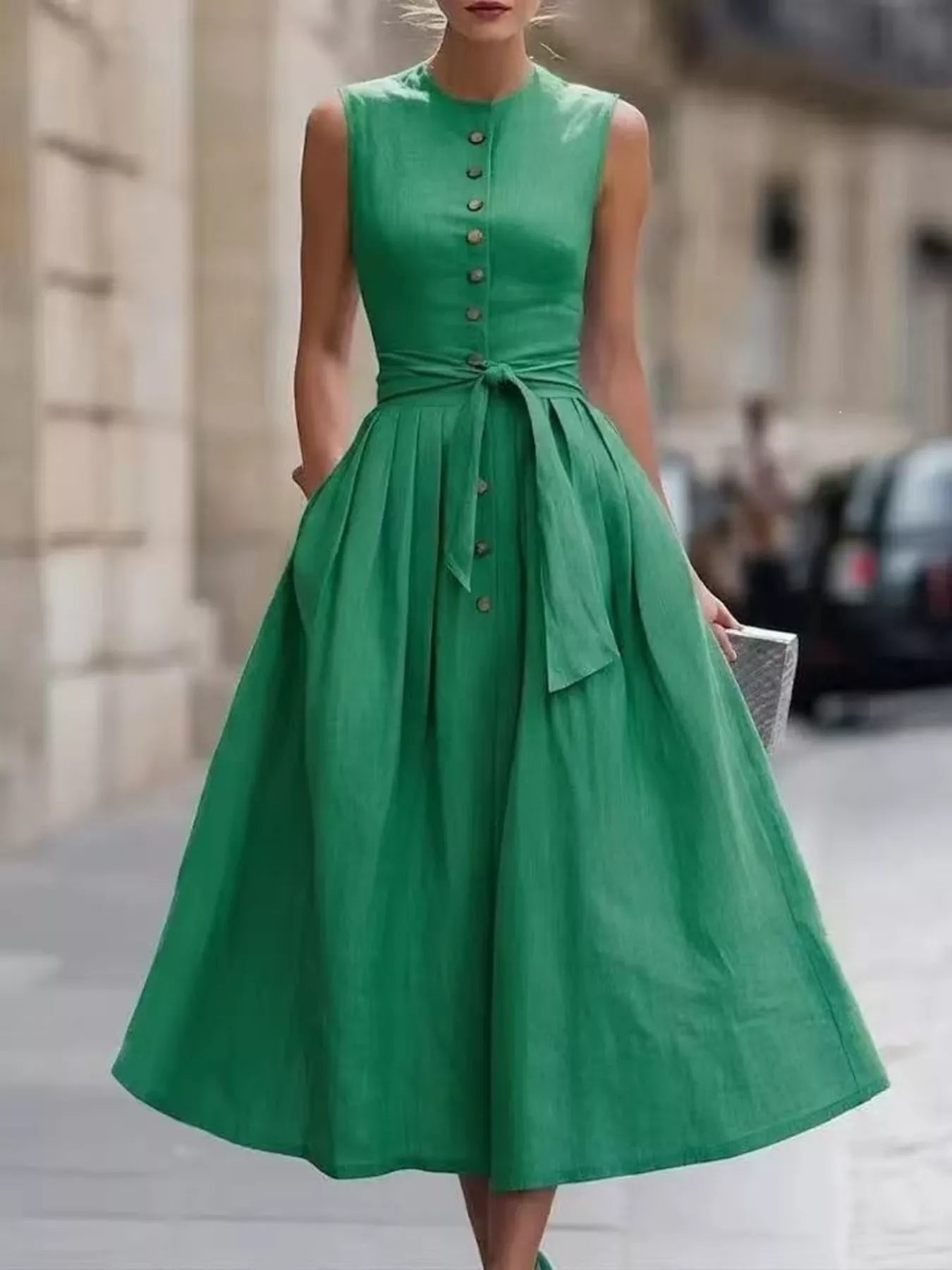 Dark green sleeveless button-front belted midi dress with tied waist belt and full skirt