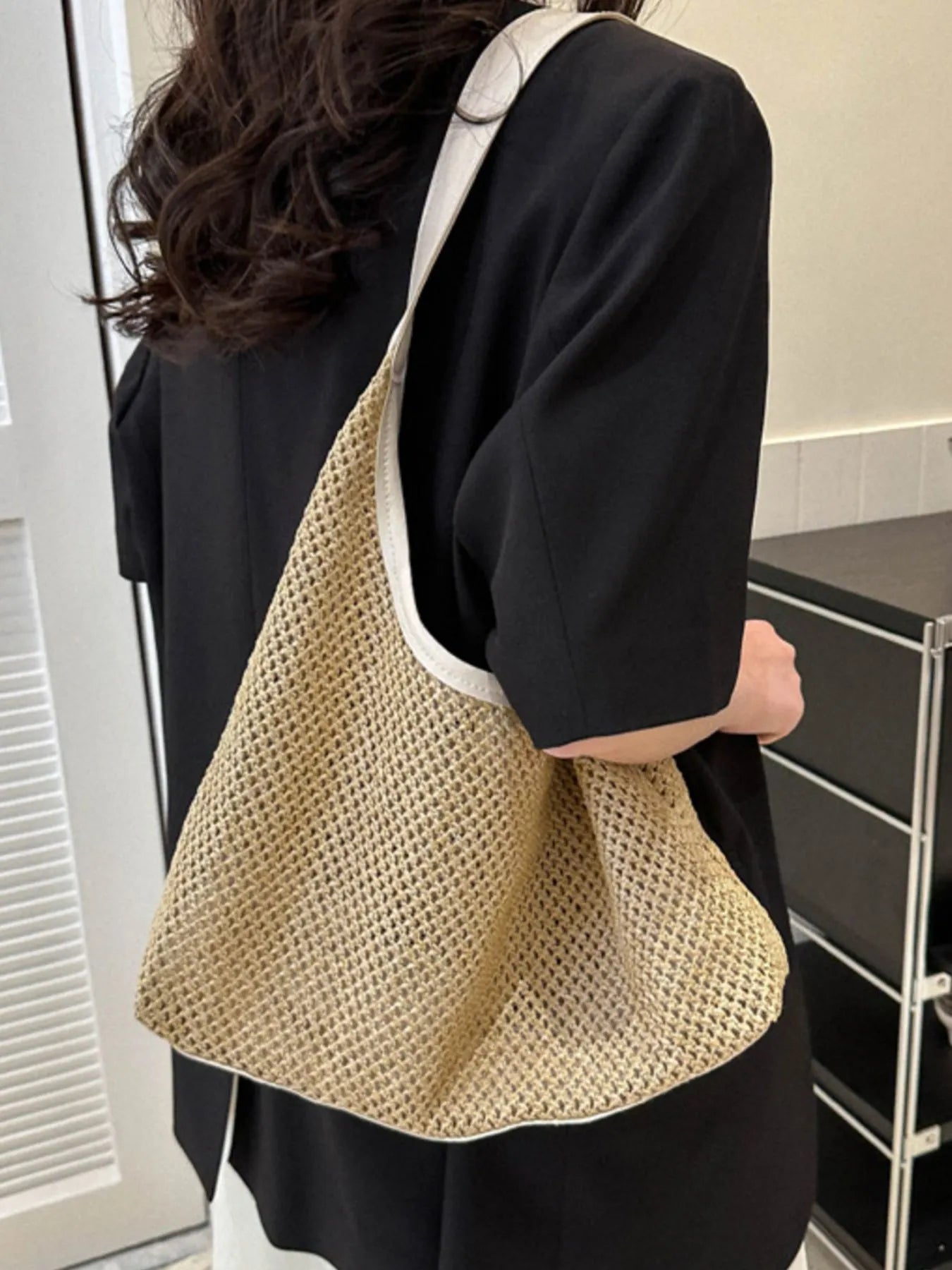 Woven straw shoulder bag in tan with cream trim and short top handles