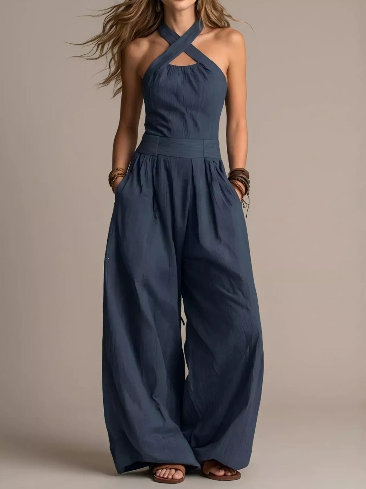 Navy halter linen jumpsuit with gathered bodice, high waist, wide legs