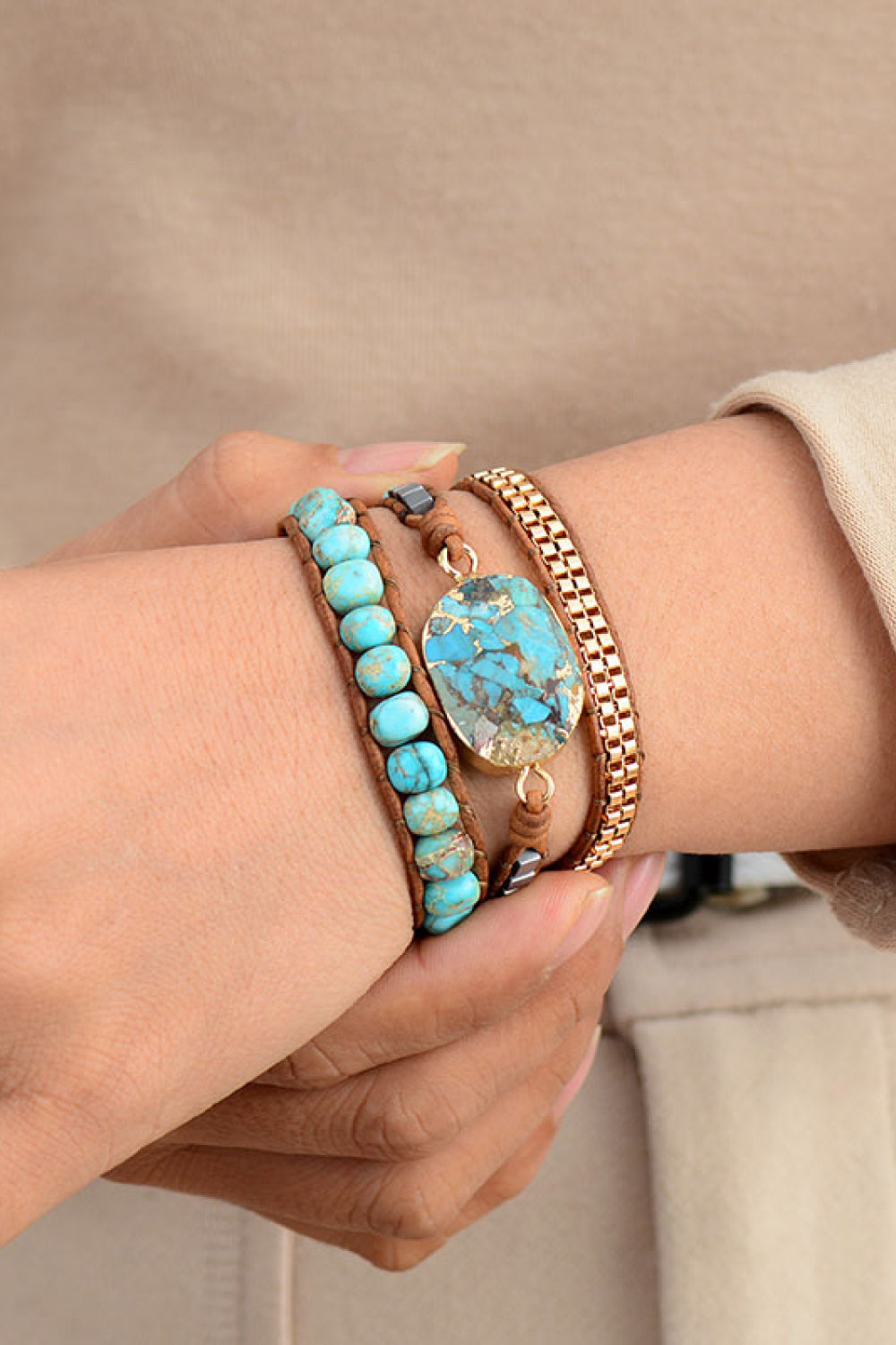 Beaded stone copper bracelet with turquoise oval cabochon and braided brown wraps