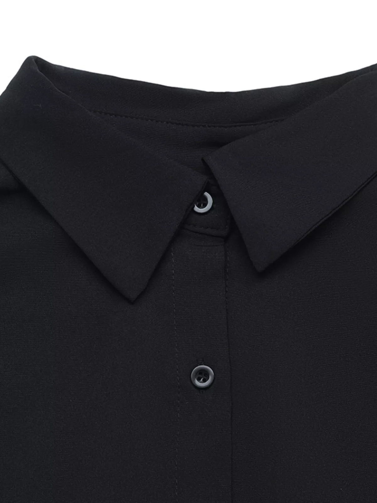 Close-up of black shirt collar with button placket
