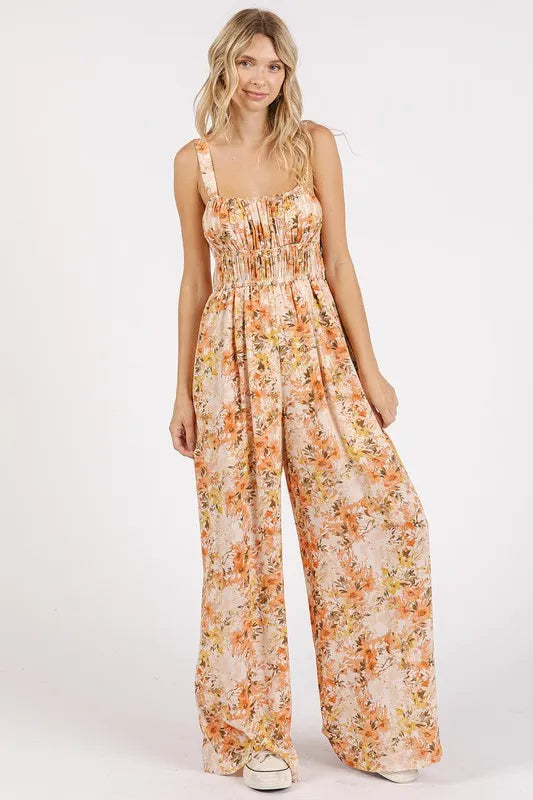 Peach floral sleeveless jumpsuit with gathered bust and wide-leg pants