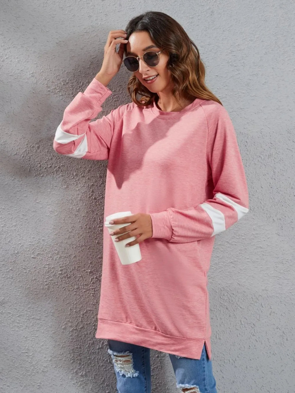 Pink long-sleeve striped round-neck T-shirt with white sleeve stripe accents