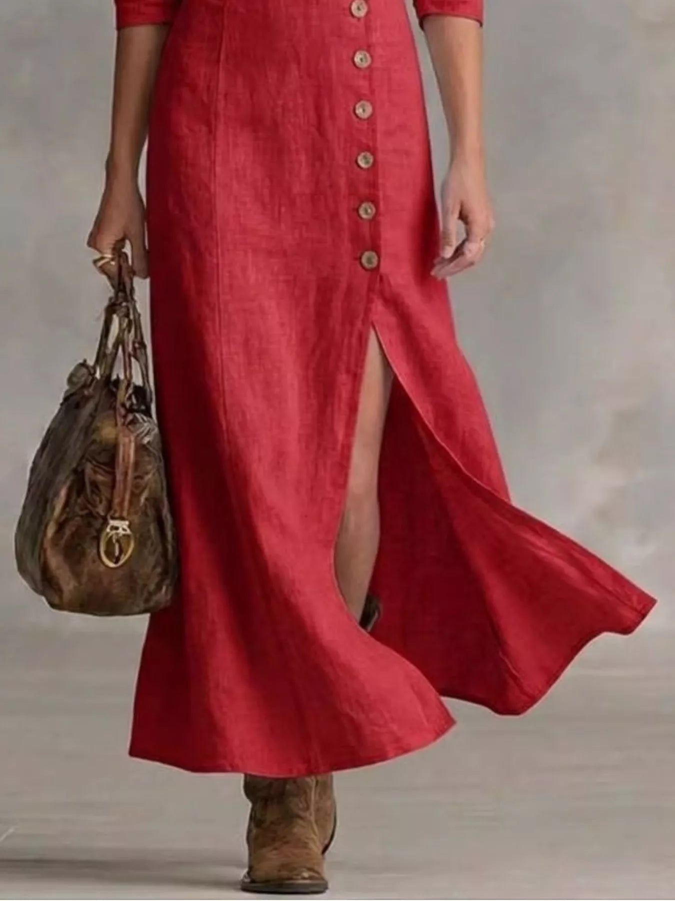 Red maxi dress showing front buttons and side slit, three-quarter sleeves