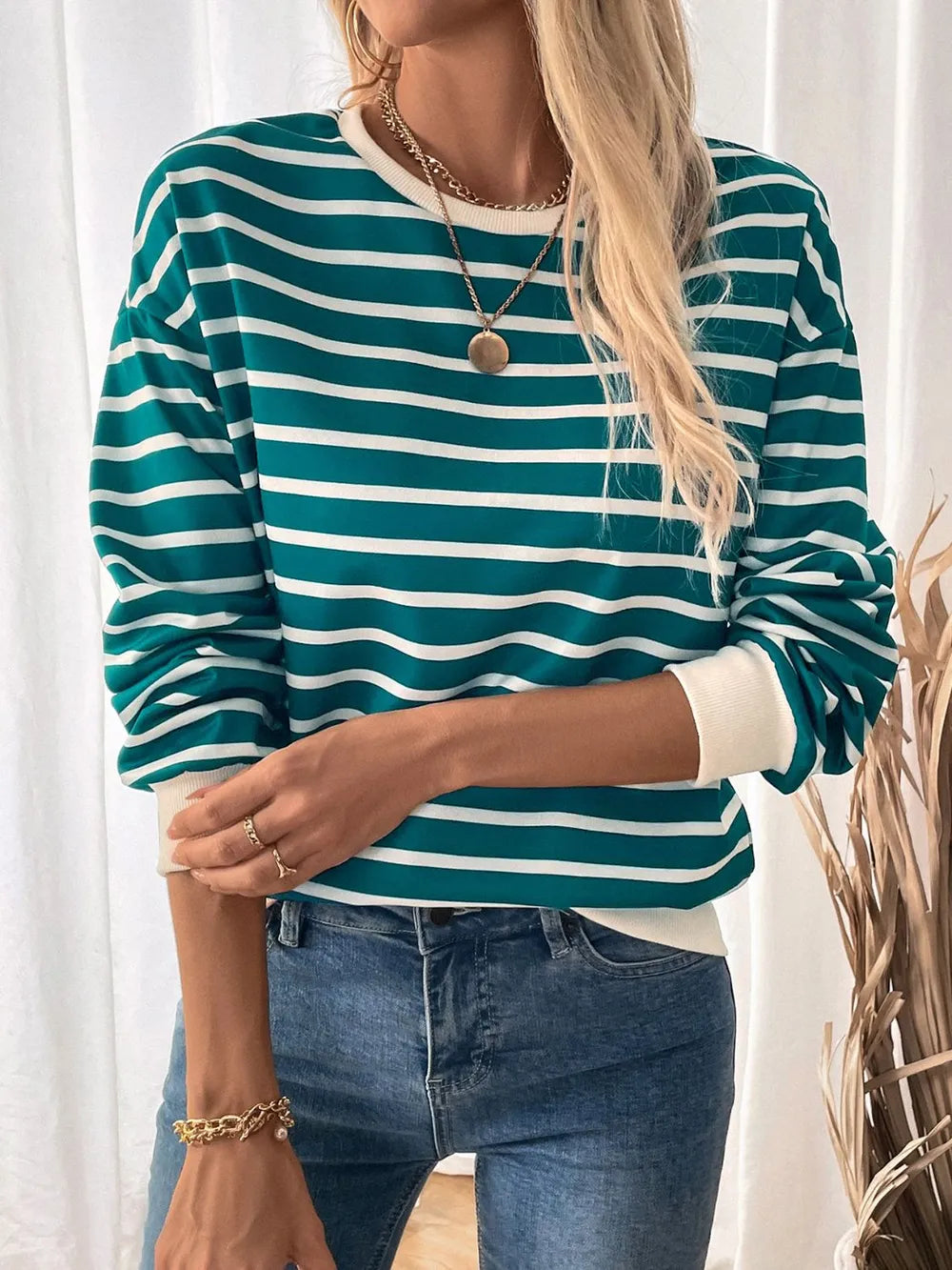 Turquoise and white striped long-sleeve sweatshirt with round neck and contrast hem