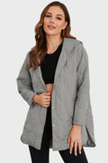 Light gray hooded winter coat with snap front and quilted diamond pattern