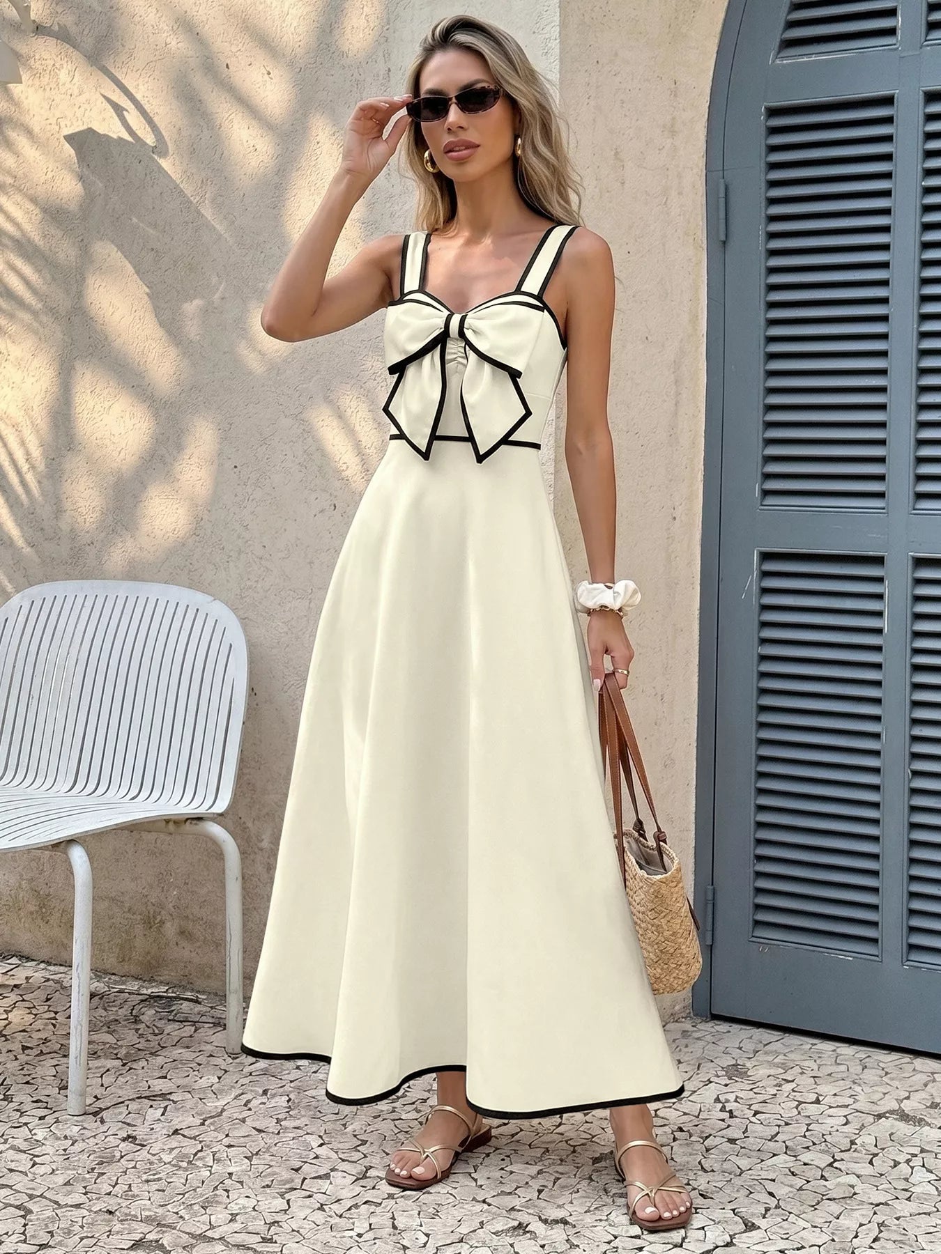 Cedar & Moore Bowknot Trim A-Line Midi Dress in ivory with black piping, bow front detail, and wide shoulder straps
