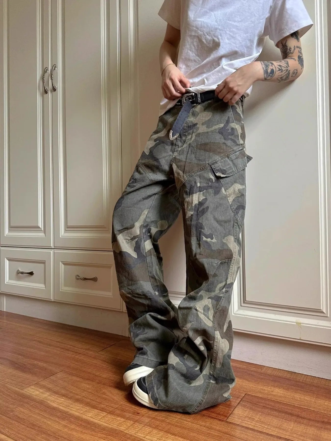 Green camouflage cargo jeans with belt loops and flap cargo pockets