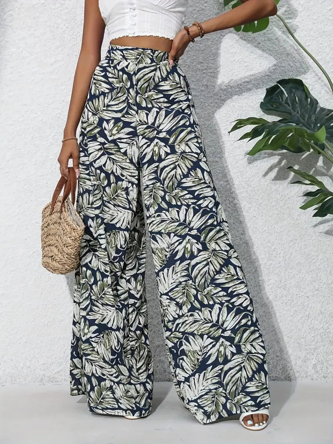 Printed high-waist wide-leg pants, navy and white leaf print, gathered elastic waist