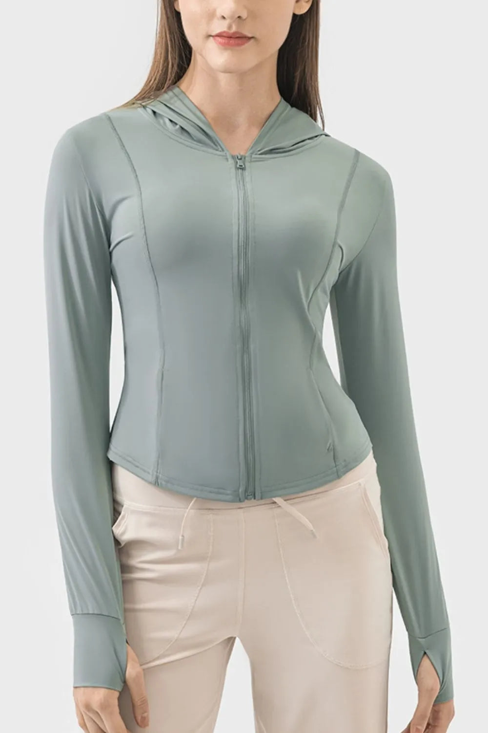 Teal zip-up hooded active jacket with long sleeves and front zipper