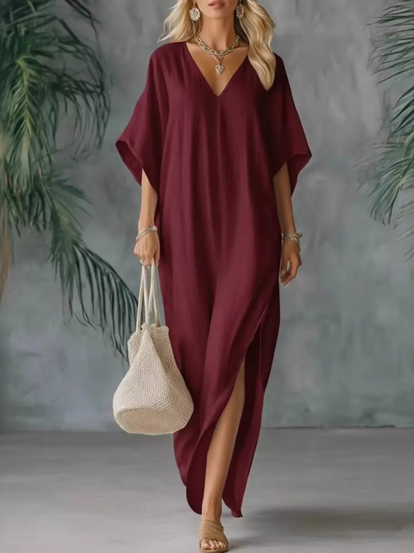 Burgundy V-neck maxi dress with short sleeves and side slits, draped loose fit