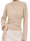 Apricot mock neck blouse with ruched waist and belted detail with gold ring