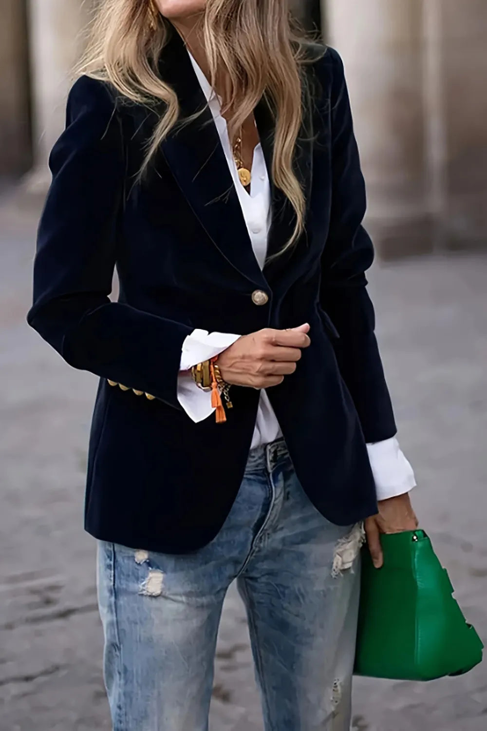 Black one-button lapel long-sleeve blazer with front button and flap pockets