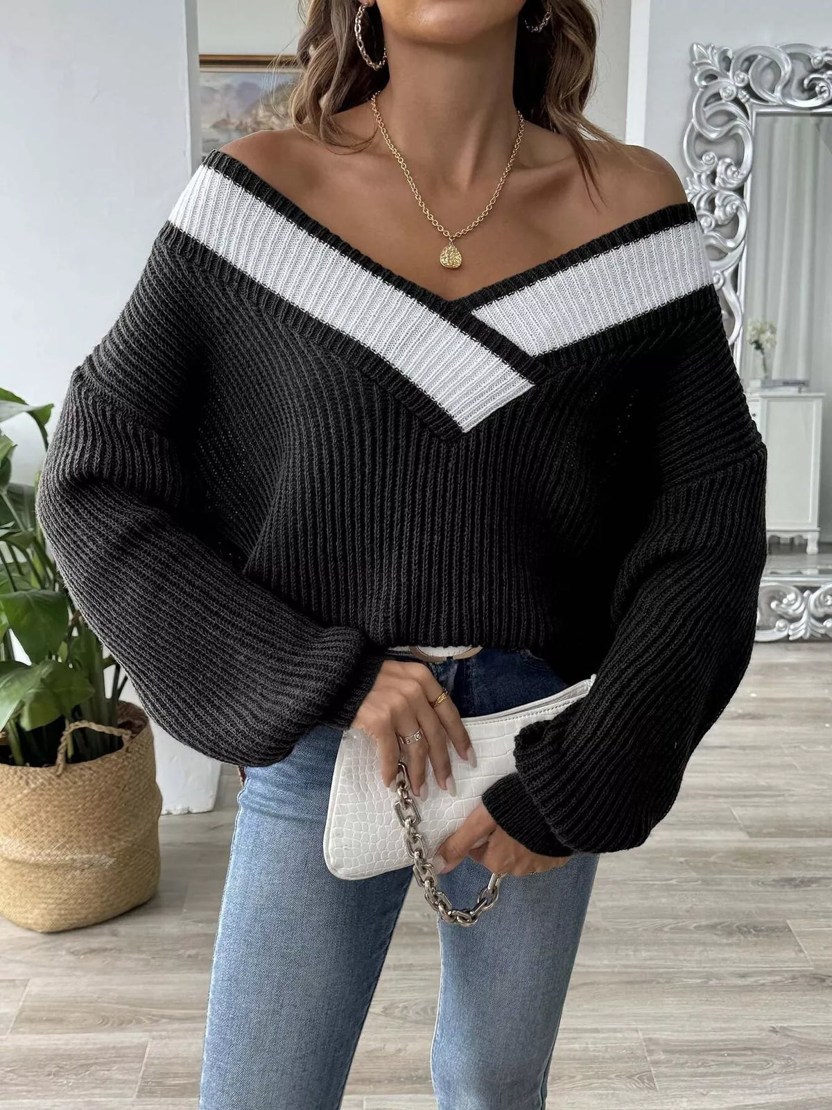 Women’s ribbed V-neck acrylic sweater with white contrast trim, black
