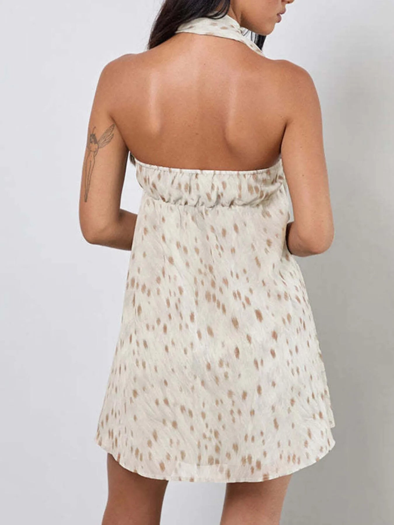 Sweetheart Neck Tube Mini Dress by Trendsi, cream fabric with tan dot pattern, back view