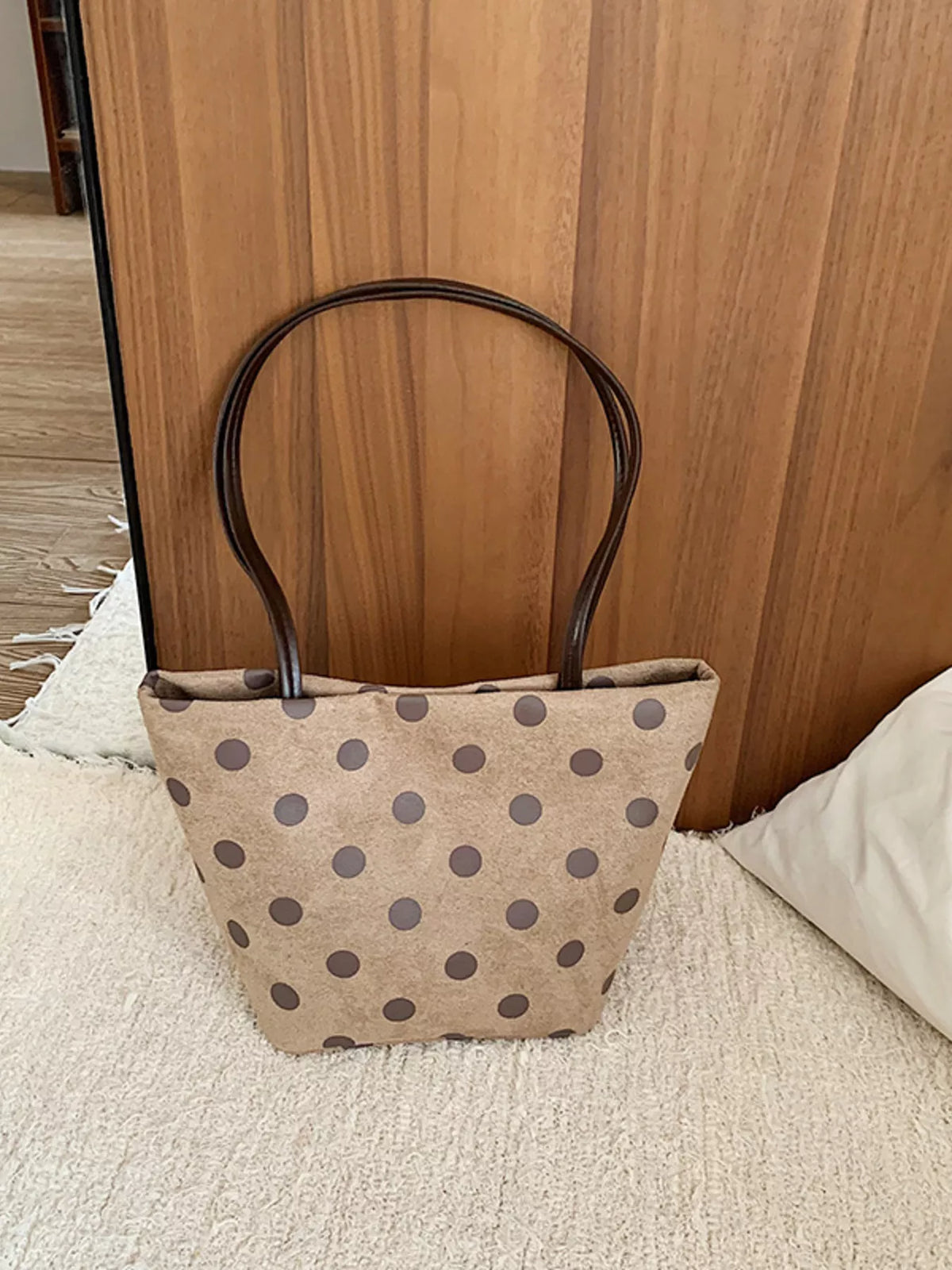 Tan polka dot suede tote handbag with two handles and cat charm keychain