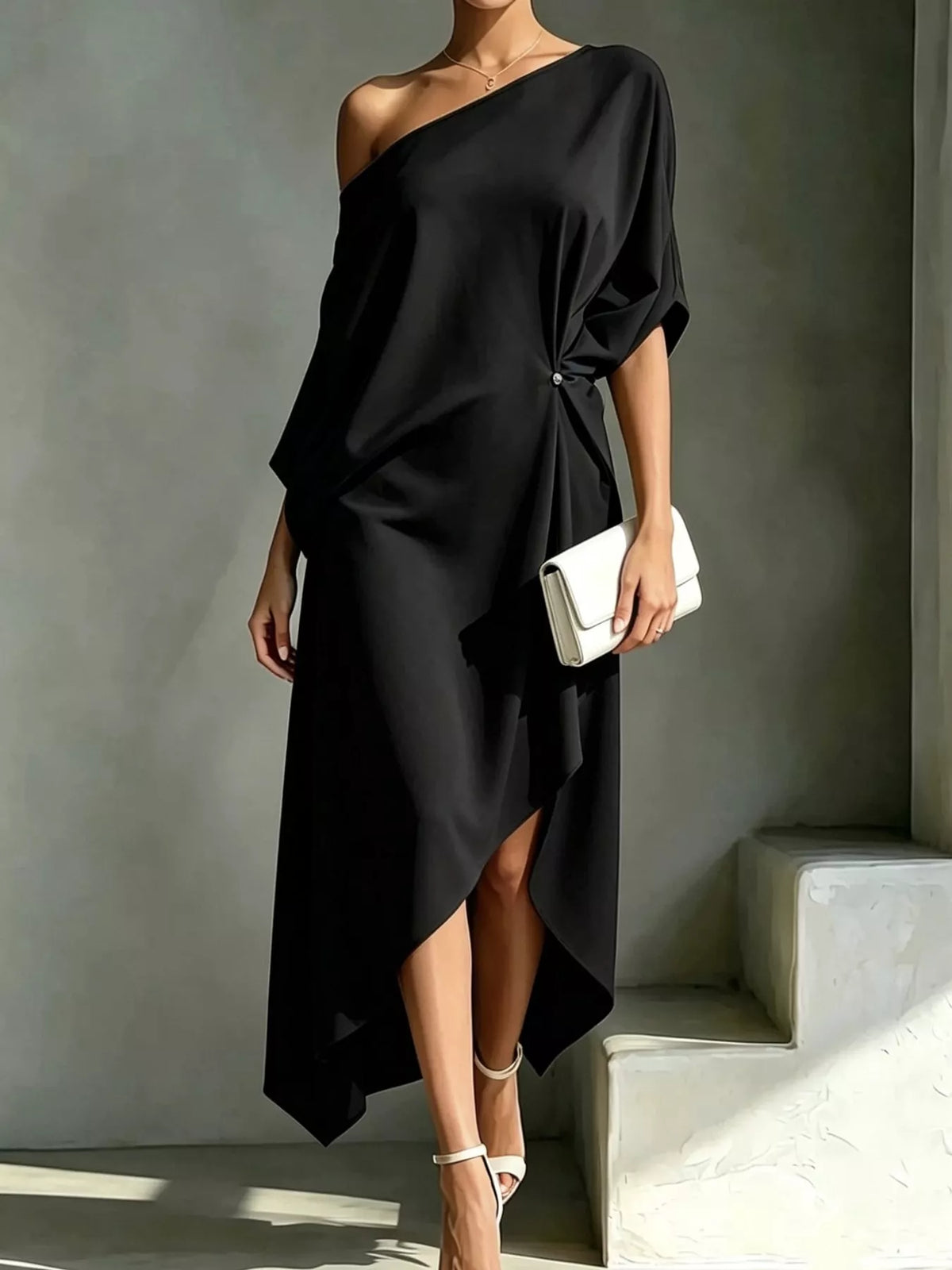 Black one-shoulder ruched asymmetric midi dress with side drape and rosette detail