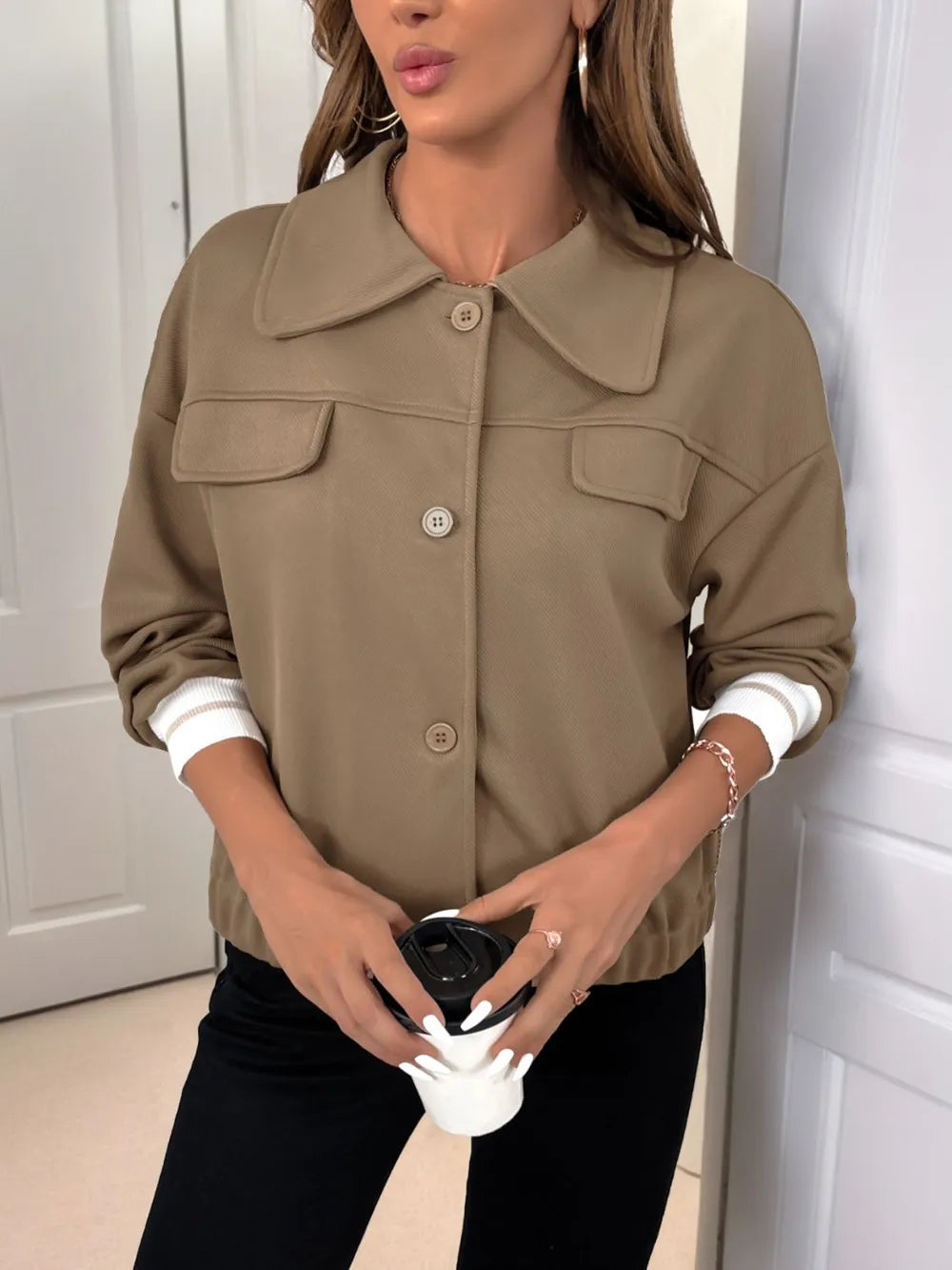 Taupe collared button-down jacket with front buttons and chest flap pockets