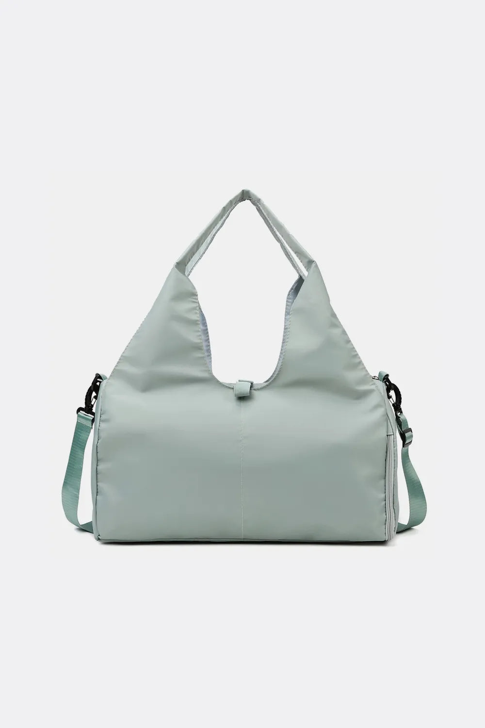Waterproof travel tote bag in gum leaf green with top handle and side straps.