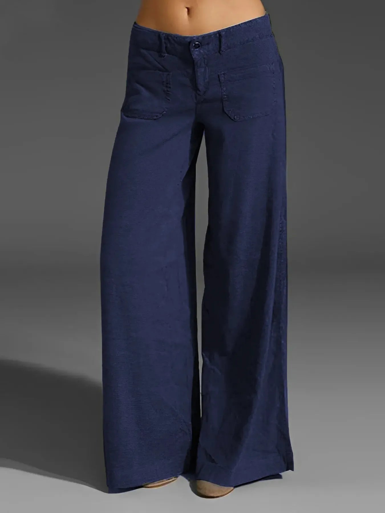 Navy wide-leg pants with pockets, button-front closure and relaxed fit