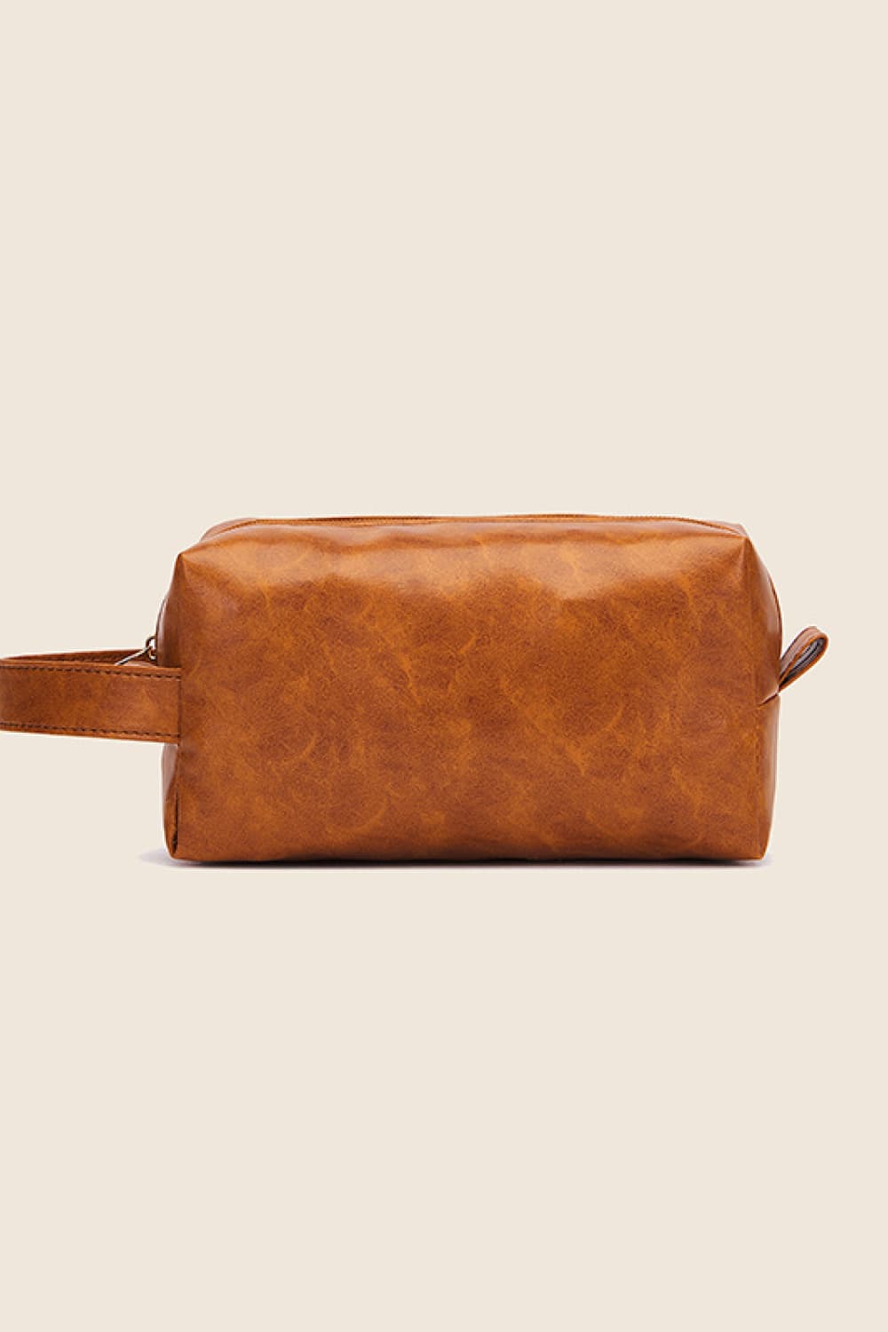 Rust-brown vegan leather makeup bag with top zipper and side handles