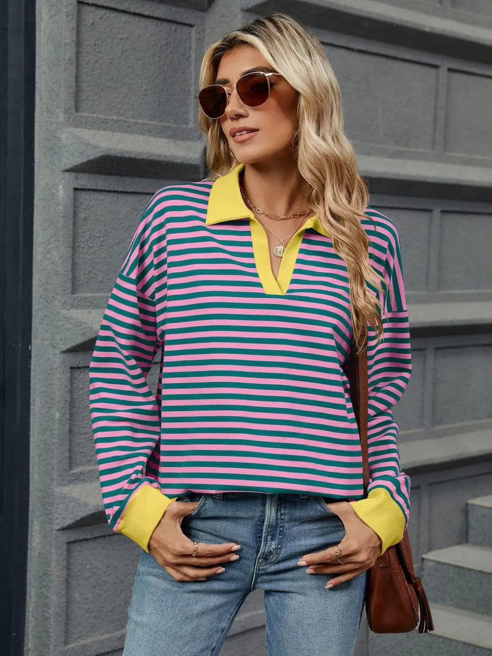 Pink-and-green striped long-sleeve sweatshirt with Johnny-style V-notch collar and yellow trim