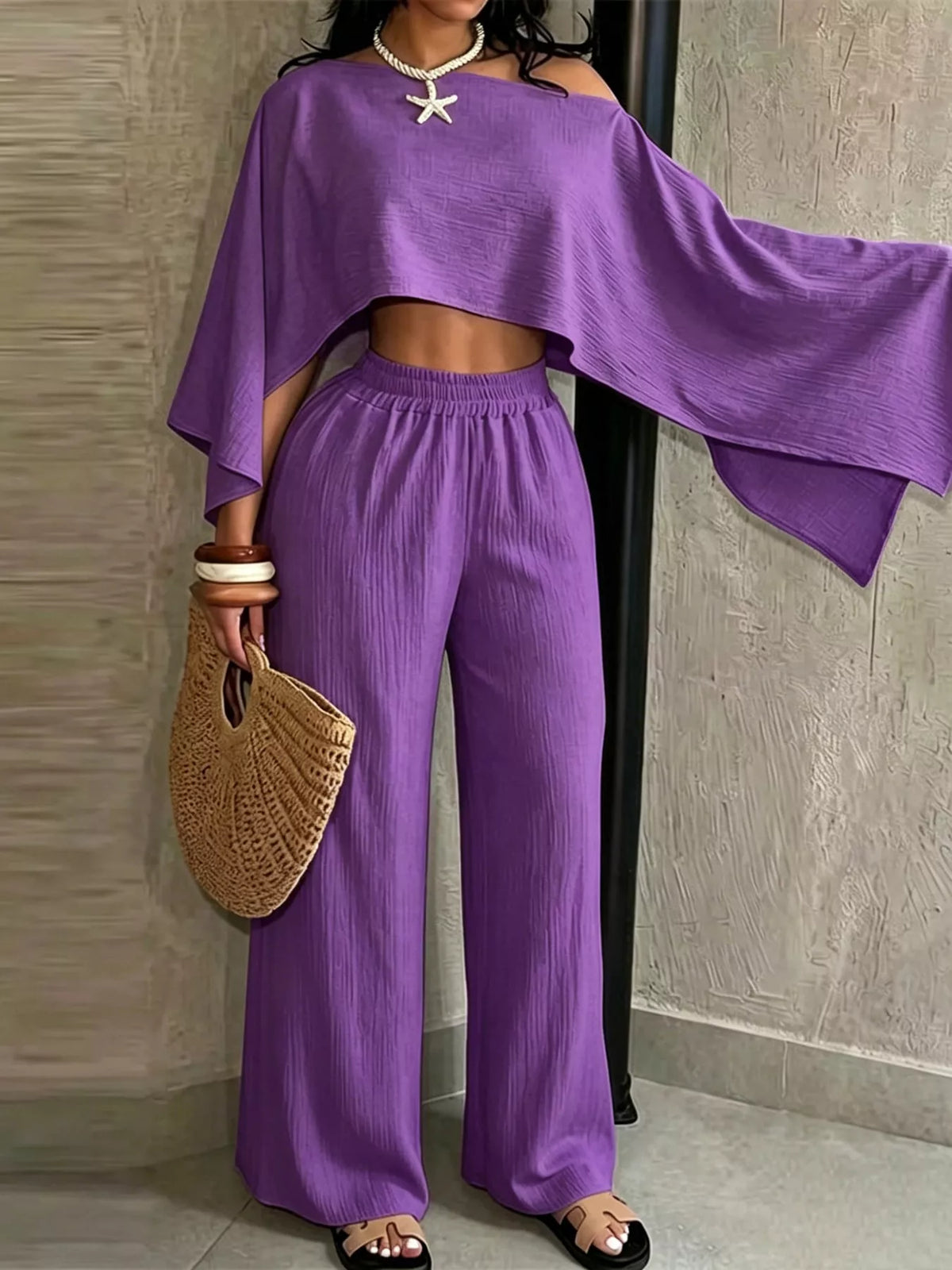 Women’s purple boat-neck crop top with wide-leg pants, loose draped sleeve detail